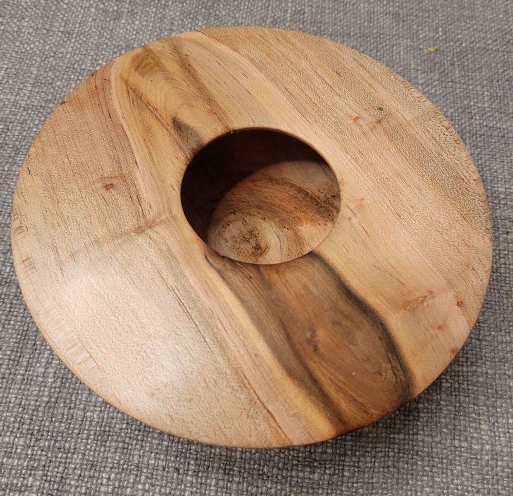 A hollow form bowl/vase turned from a log.