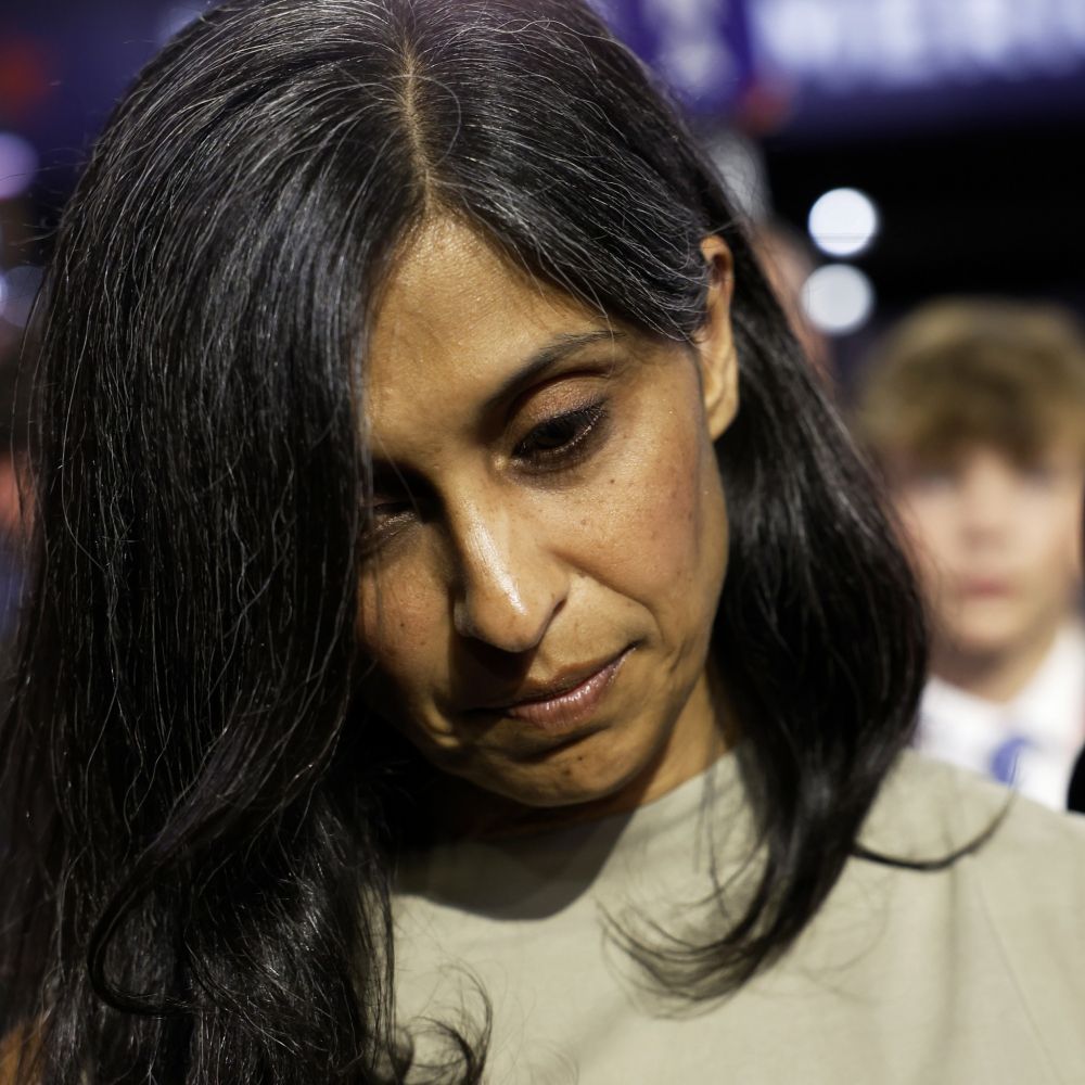 usha vance looking down and not smiling 