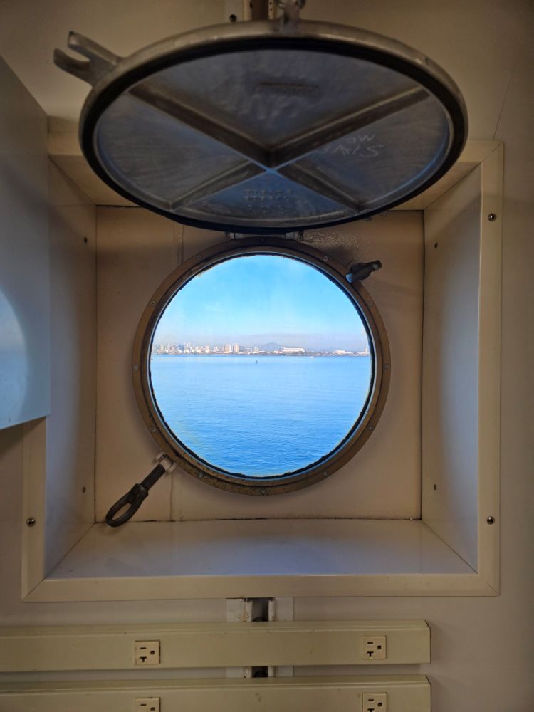 View of the Bay from a porthole on the ship