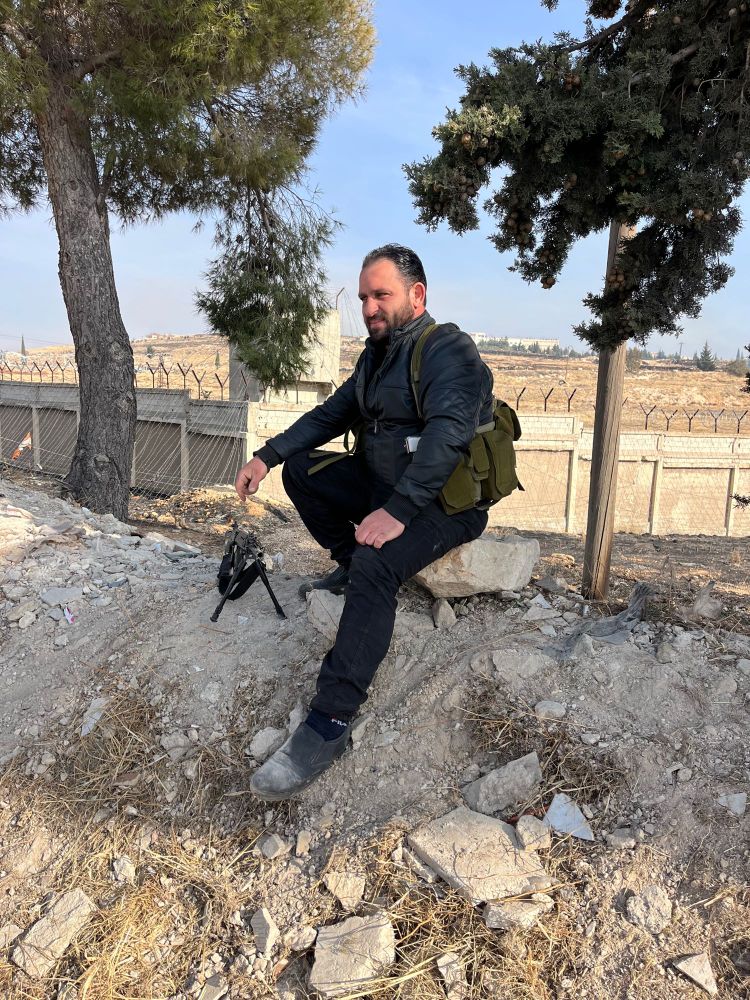 Fighter poses with Belgian rifle