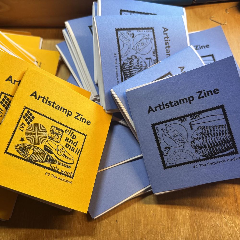 the first two issues of Artistamp Zine. #1 ‘The Sequence Begins’ has a blue cover and #2 ‘The Alphabet’ has a goldenrod cover. they are about 3 inches square ns have white inner pages.