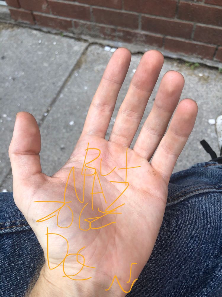 a hand that says but ize must be dew strawberries