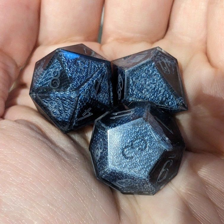 Three nearly-finished jice: a j20, j12, and j10. They have been sanded and polished, but not yet painted.