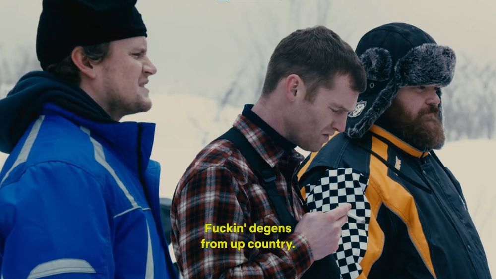 Letterkenny gang in full snow outfits except for Wayne who still has his flannel shirt.

Wayne says "Fuckin' degens from up country."
