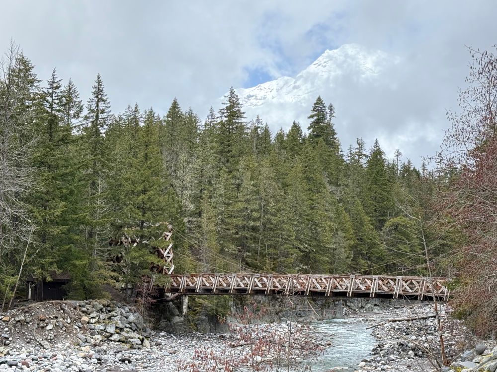 The Nisqually River Bridge, and a peekaboo view of the top of Mount Rainier