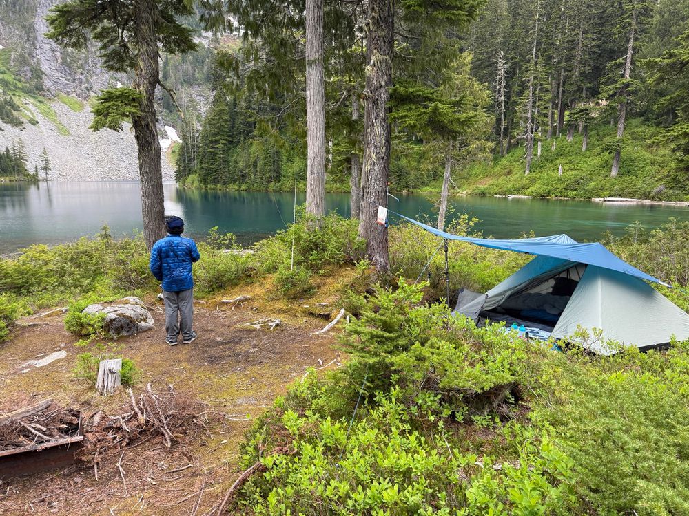 Photo of our camp site with the lake in the background.
