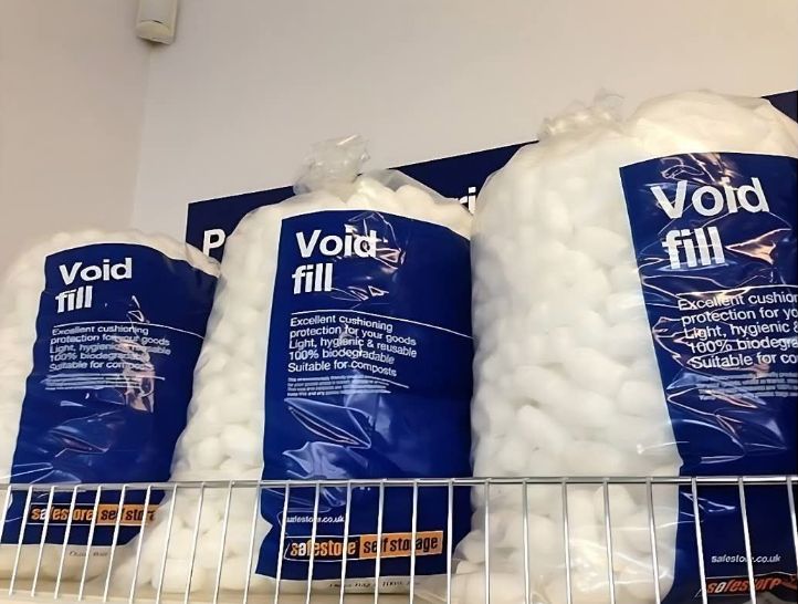 bags of foam pellets labeled Void Fill 