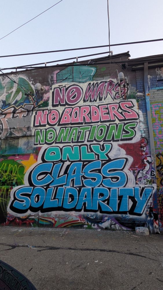 graffiti reading 

no war
no border 
no nations 
only class solidarity 