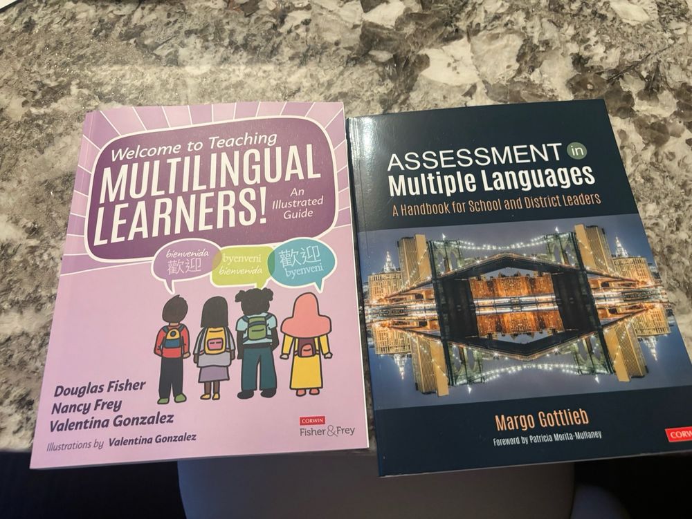 Two books/ welcome to teaching multilingual learners with a pink background and animated students. Second book is Assessment in Multiple languages either a bridge and city in the background at night