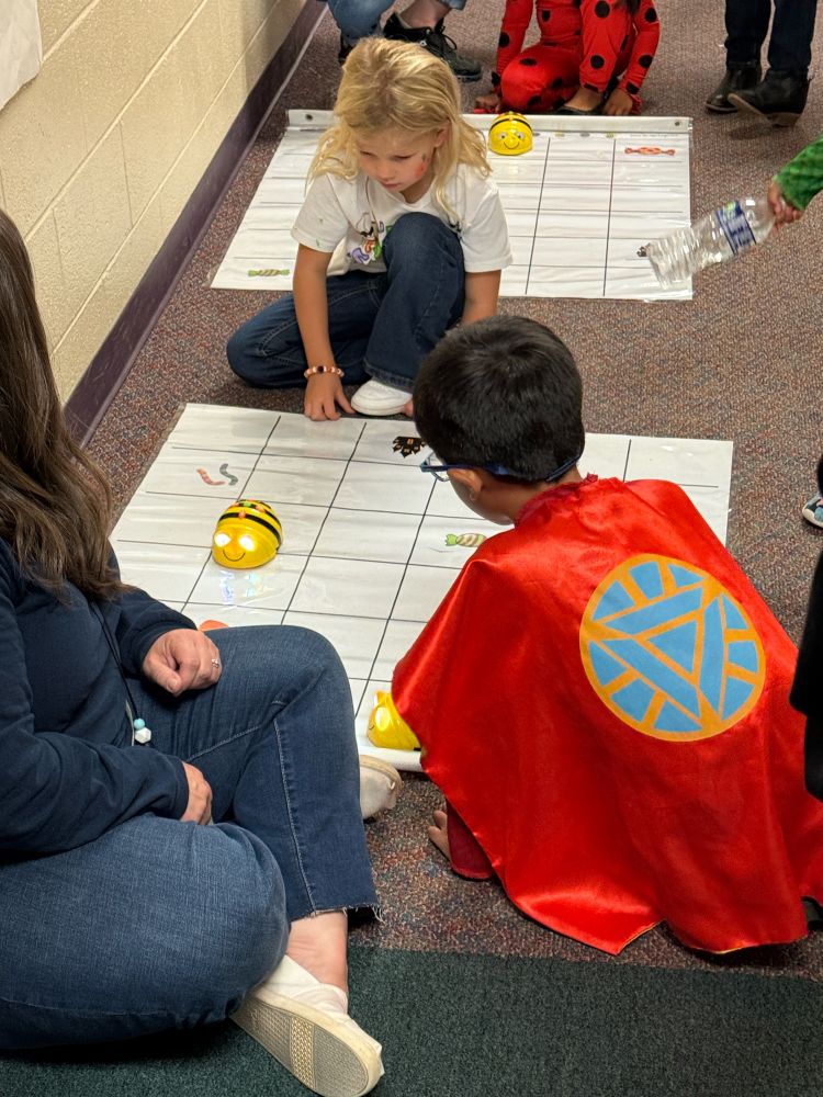 Child controlling a beebot