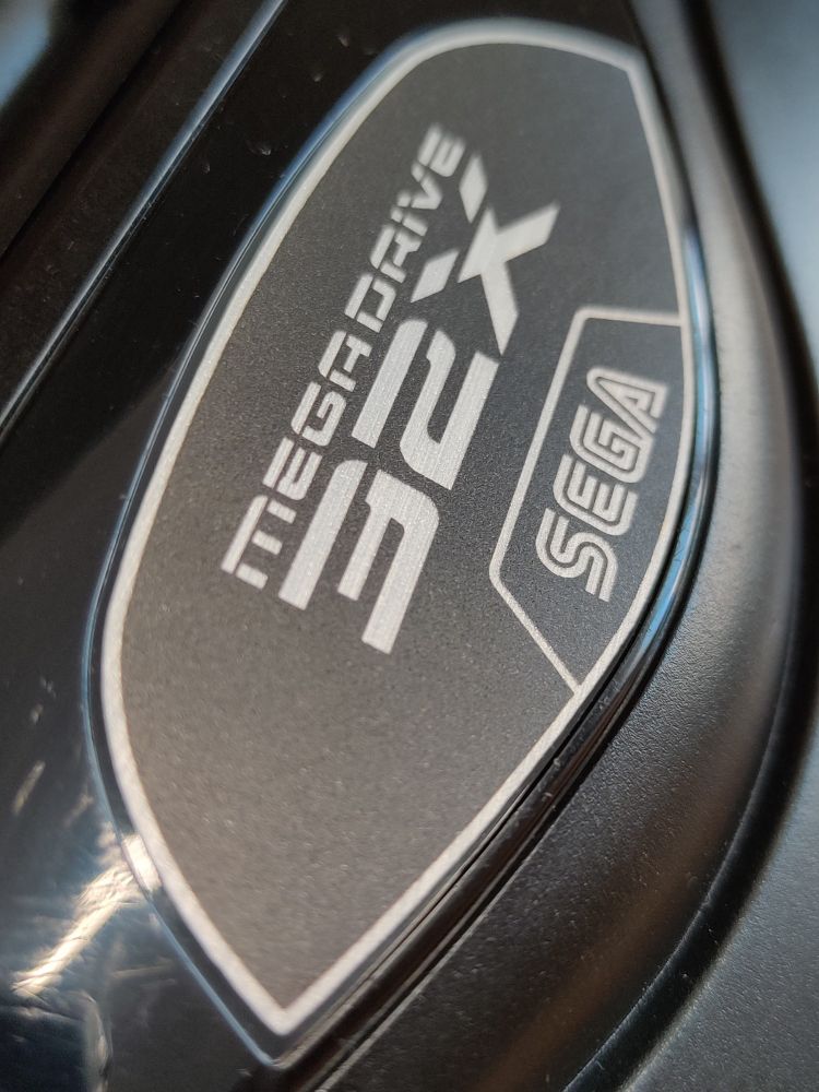 Close up of the replacement label placed on the Sega 32X