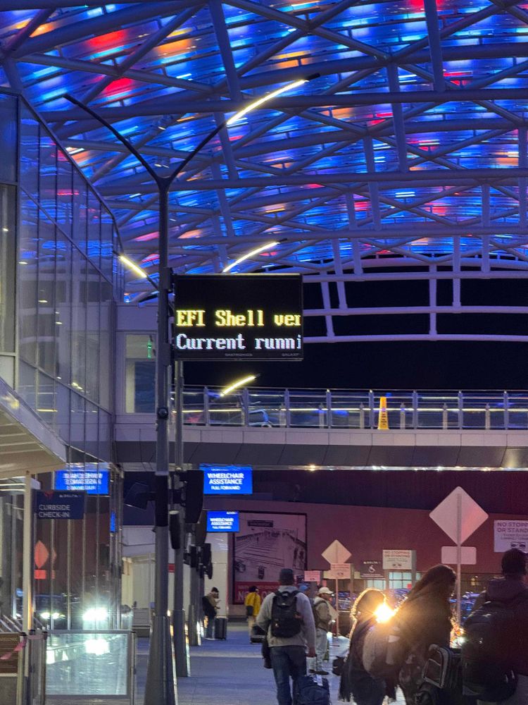Photo of an airport error sign that says EFIShell on it