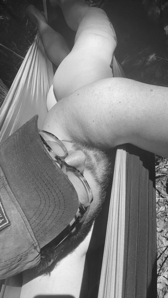 Tasteful nude.  Trying to get some sun on my white rear. Naked in a hammock. 