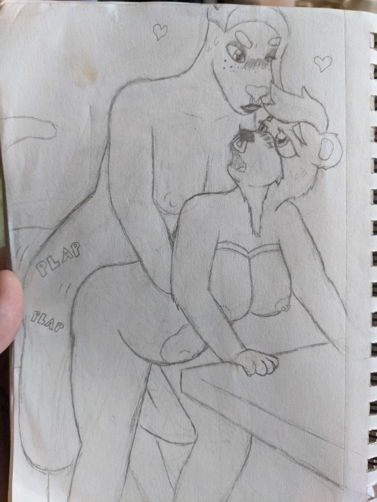 Pencil art of a kangaroo girl and a bear girl having sex leaning against a table. 