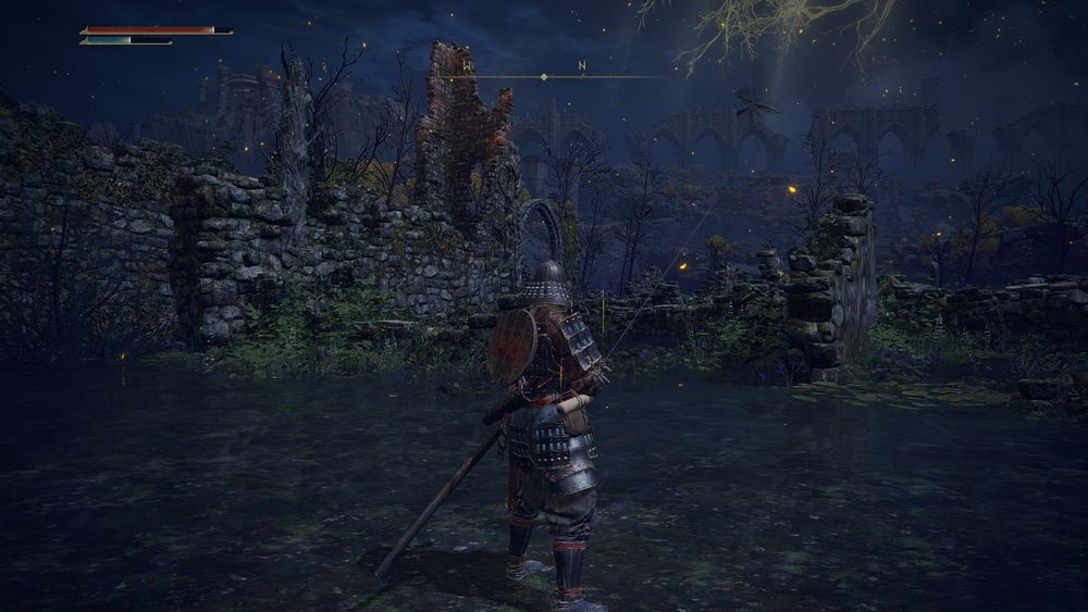 Screenshot of Elden Ring: my samurai gal inspecting some ruins at night.