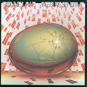 The illustrated album cover of Ronnie Laws' Pressure Sensitive depicts a metallic egg with cracks in it, surrounded by a perspective distorted wall of windows towering up high on all sides.