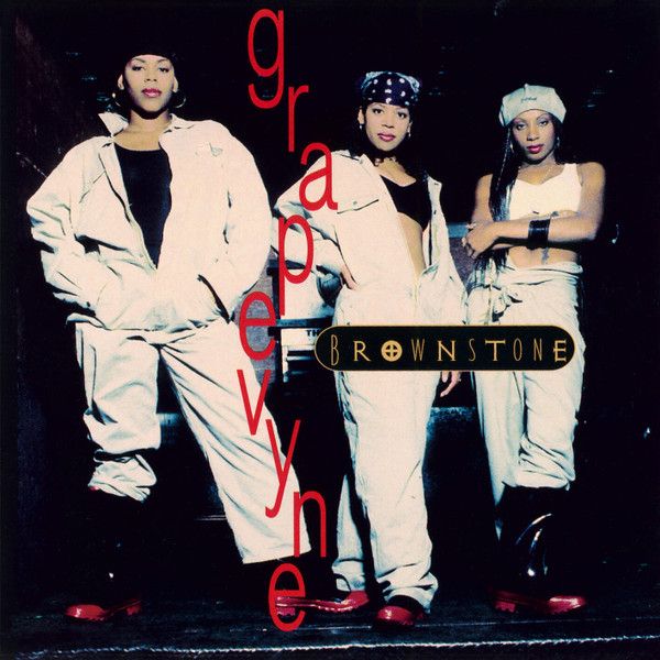 Single cover of Brownstone's "Grapevyne" featuring all 3 women in hip-hop styled baggy denim jump suits with black sports bras or tees visible beneath. 3rd member Charmayne "Maxee" Maxwell wears a white sports bra with her midriff exposed casually.