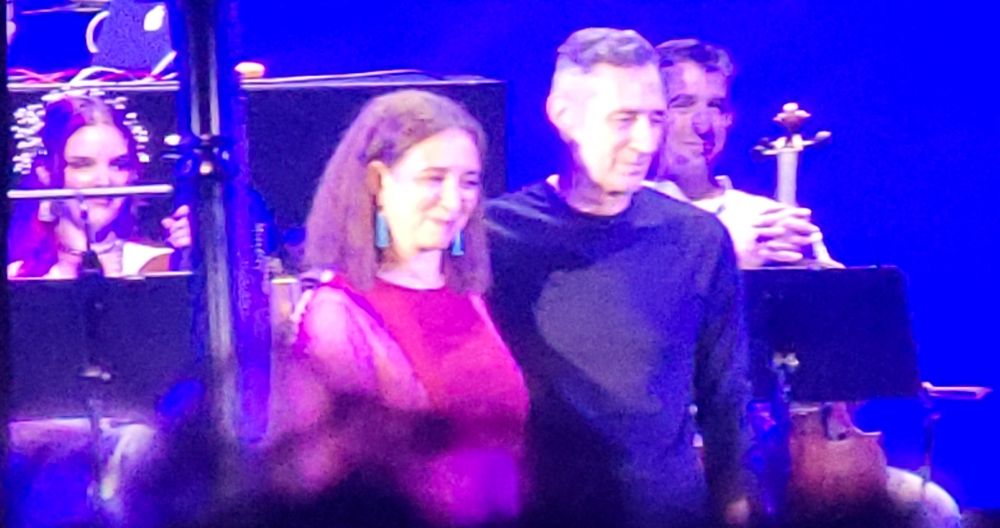 Maya Rudolph and Richard Rudolph look on after walking Stevie Wonder onto the stage at Perfect Angel: The Definitive Minnie Riperton Tribute.