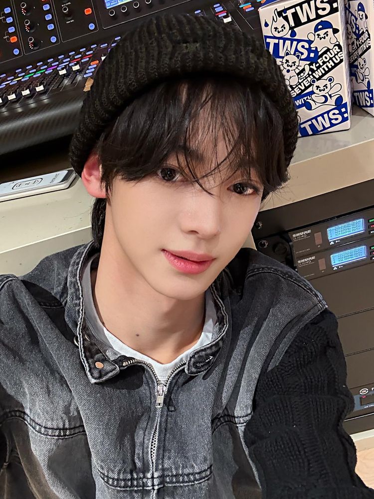 hanjin selfie in a black beanie