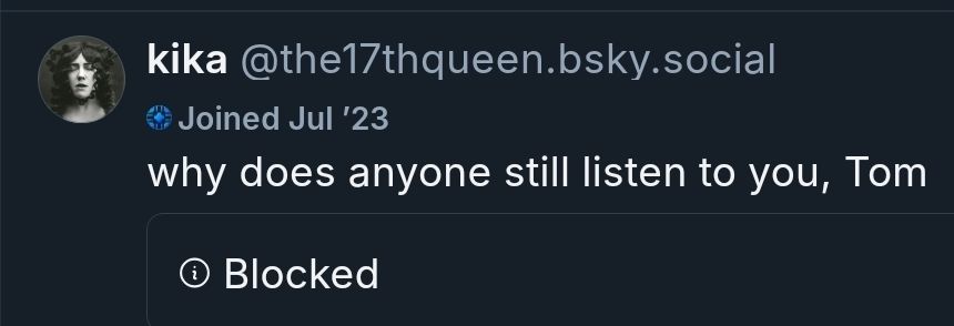 Screenshot of Kika's quote post asking "Why does anyone still listen to you, Tom". The quoted post is marked as blocked for me. 