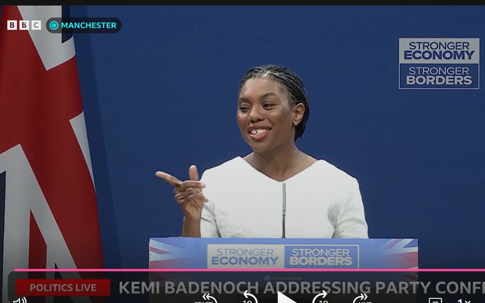 Kemi Badenough winking and pointing