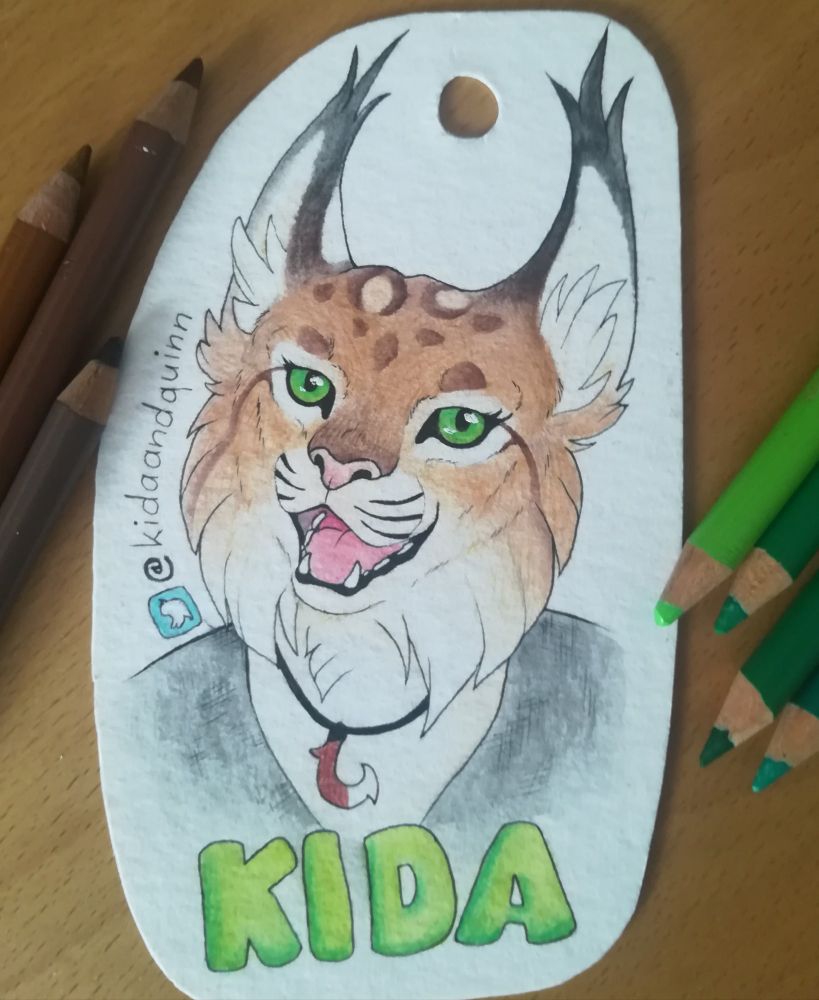 Traditional drawing of a badge with my lynx sona 'Kida' 