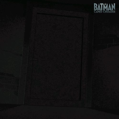 a poster for batman caped crusader shows a silhouette of batman standing in a doorway