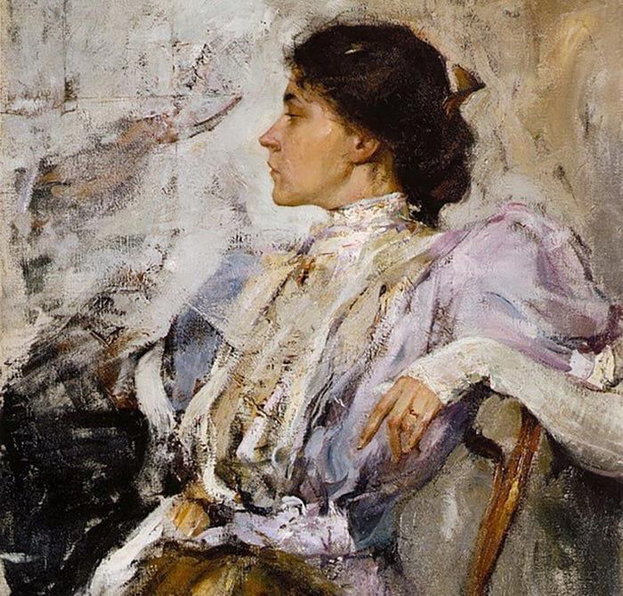 a Nikolai Fechin painting, Portrait of an Unknown Woman.

A Victorian era woman with dark brown almost black hair pulled up into a loose bun secured with a brown comb is wearing a puffy blue dress with white long sleeves and a high collar as she sits facing towards the left in a chair with her left arm draped over the back of the seat. The style is very loose and painterly yet also very realistic and virtuoso.