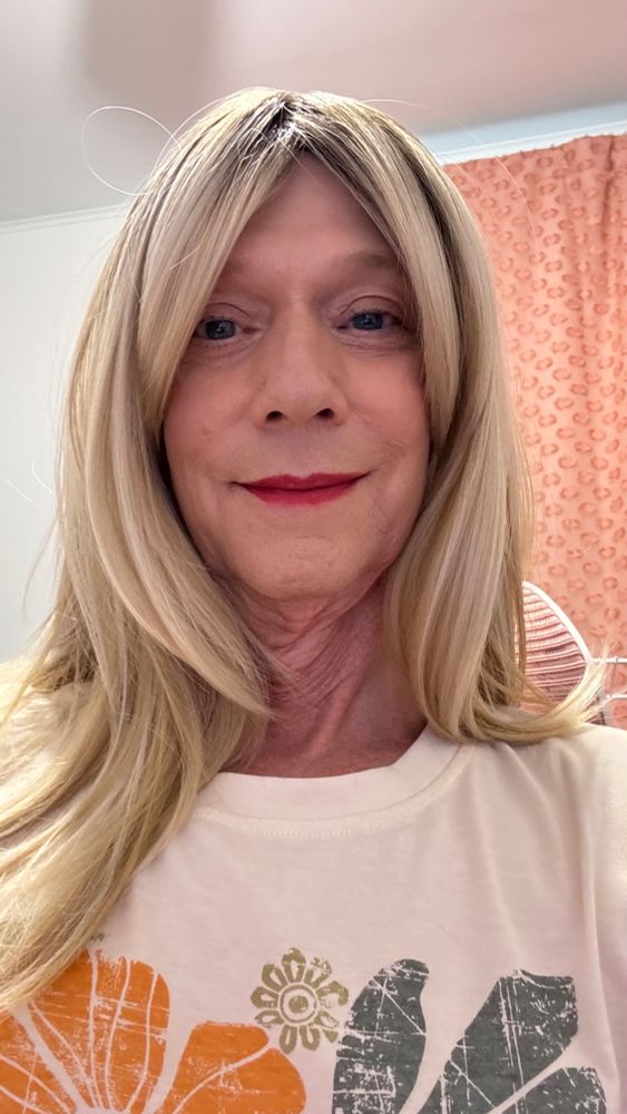 White trans woman showing her throat cancer pics. 