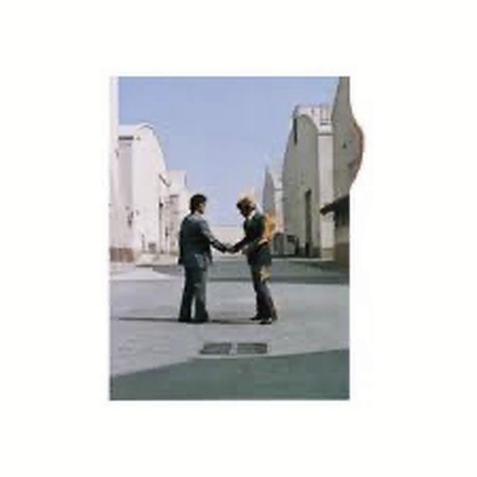 Cover of Pink Floyd's 'Wish You Were Here' album, which depicts two suited men shaking hands. One of them is on fire, but doesn't seem to realise.