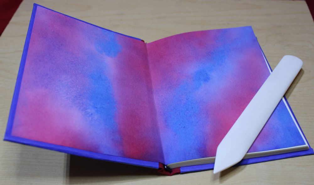 Endpapers of book. They are red and blue.