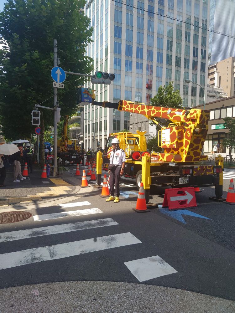 Not actually a giraffe. A vehicle for trimming trees painted in giraffe colours 