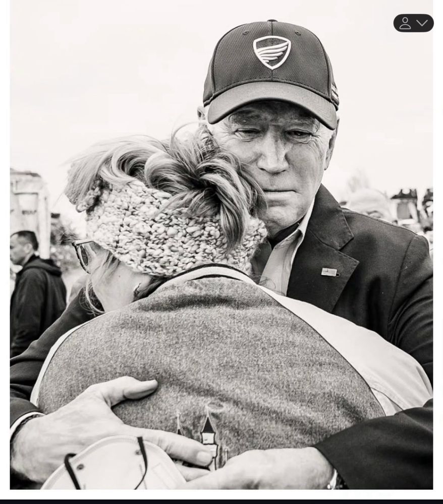 Biden comforting a woman in Kentucky after hurricane hit