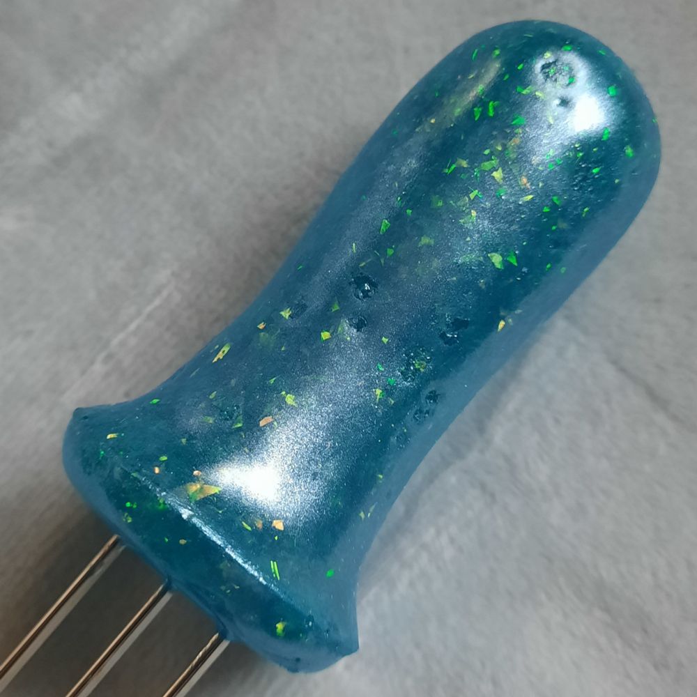 A frosted blue ergonomic handle 