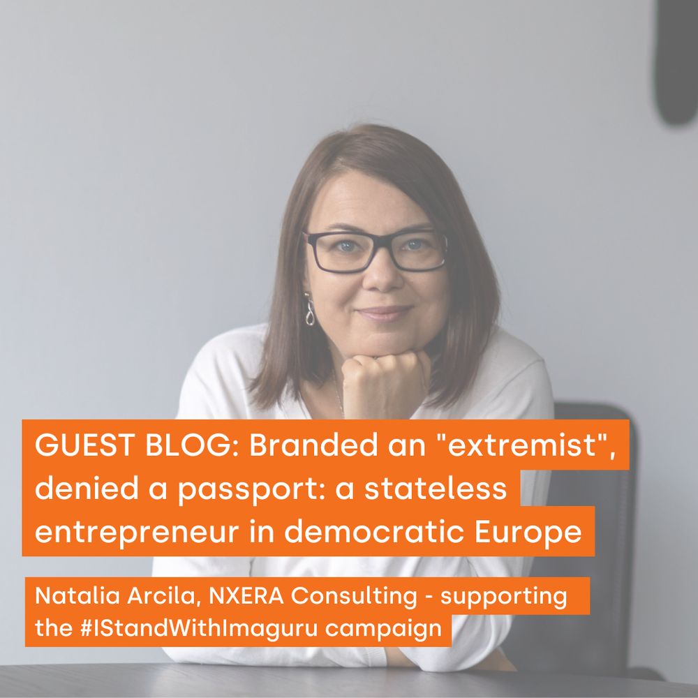 In the foreground, white text on an orange background reads: "GUEST BLOG: Branded an "extremist", denied a passport: a stateless entrepreneur in democratic Europe." Below that, text reads: "Natalia Arcila, NXERA Consulting - supporting the #IStandWithImaguru campaign". The text is against an image of Tania Marinich, who the blog is about, who is sitting confidently at a table with her chin rested on her hand. She wears glasses and a white blouse.