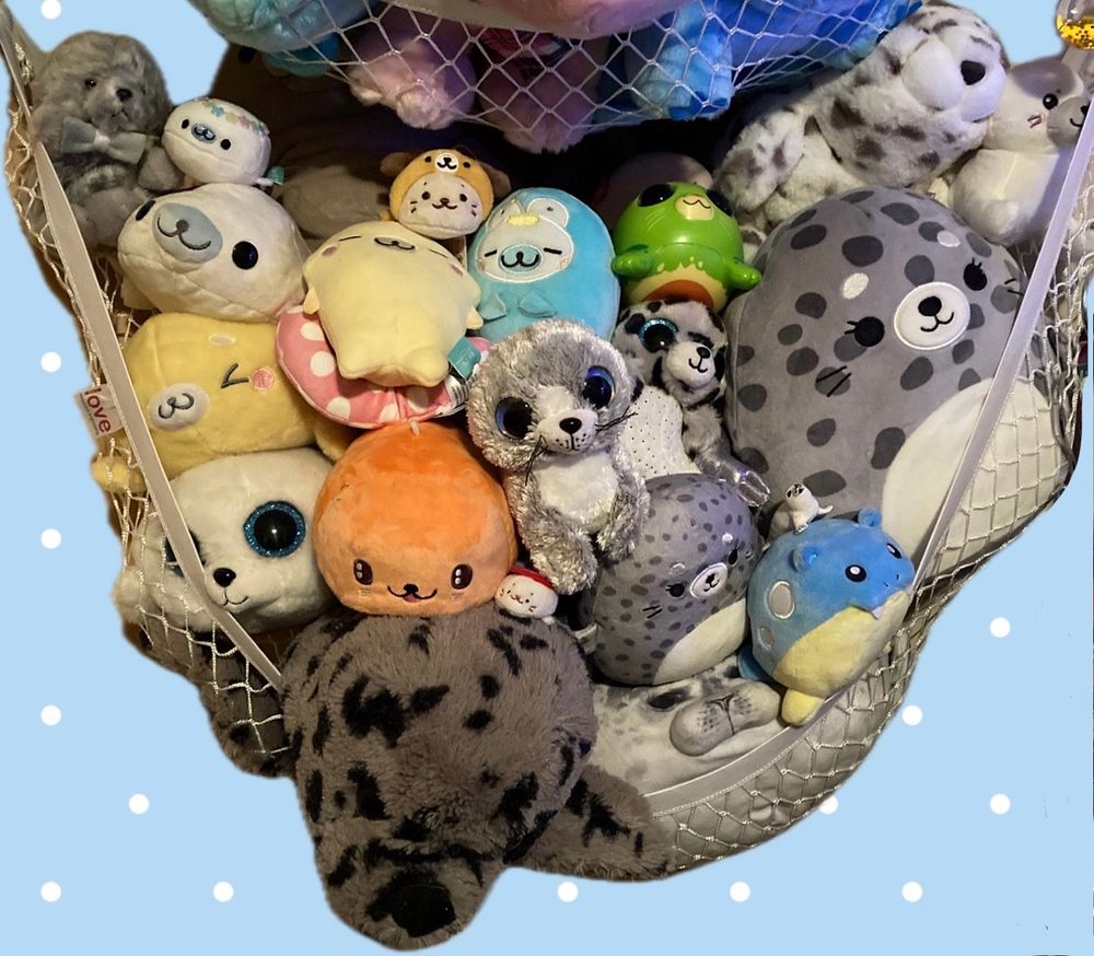 A plush net full of seal plushies 