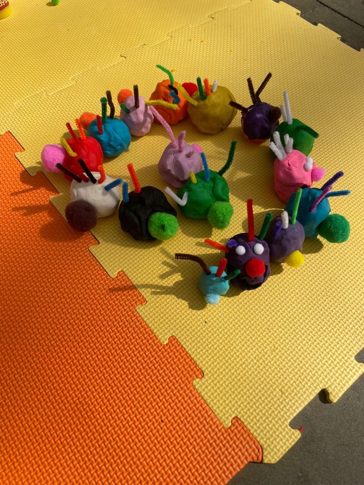 play-dough hair cells arranged in a spiral to represent the cochlea.
