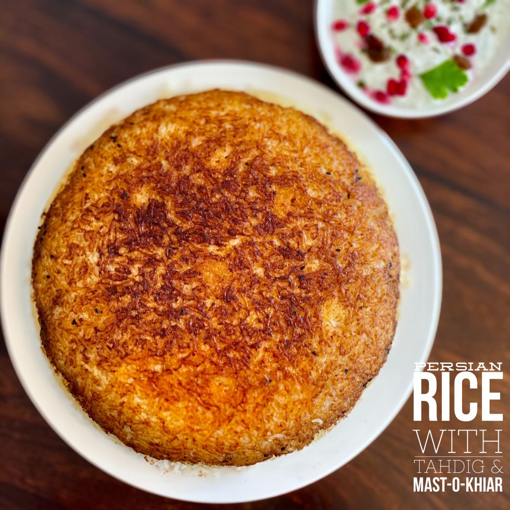 Alt-Text für das Bild:

A golden, crispy Persian tahdig (scorched rice) served inverted on a white plate, showcasing its uniformly browned crust. In the background, a bowl of mast-o-khiar (Persian cucumber yogurt dip) garnished with pomegranate seeds, raisins, dried mint, and a sprig of parsley sits partially visible. The table is dark wood, creating a warm, contrasting background. Text on the image reads: “Persian Rice with Tahdig & Mast-o-Khiar.”

