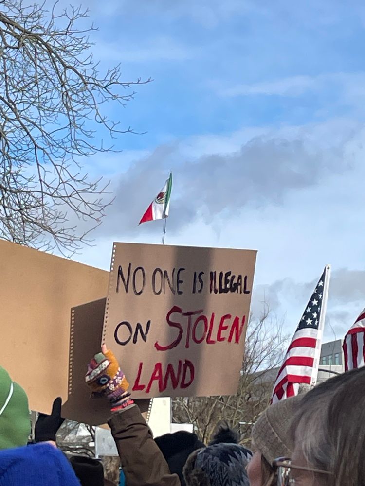 Protester sign reading No one is illegal on stolen land
