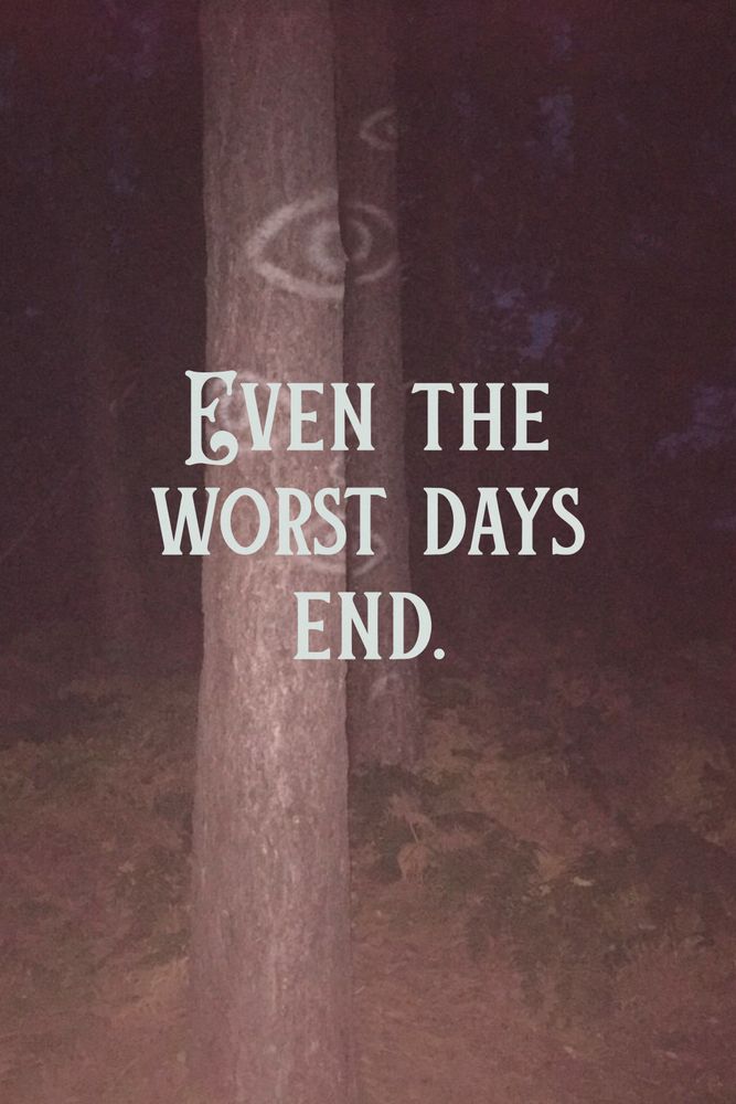 the phrase "Even the Worst Days End" overlaid on top of trees with eyes carved into them. 