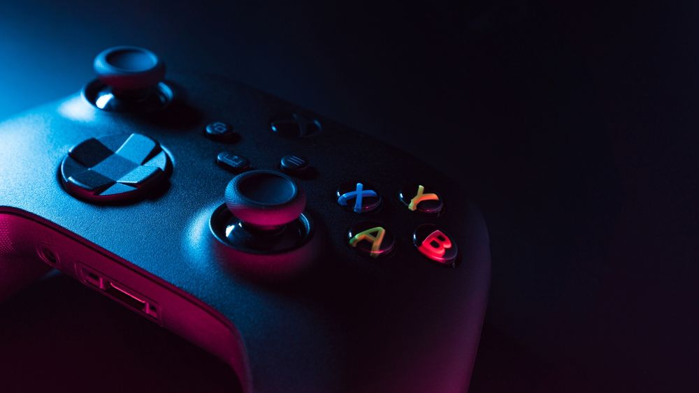 an xbox controller, ominously lit