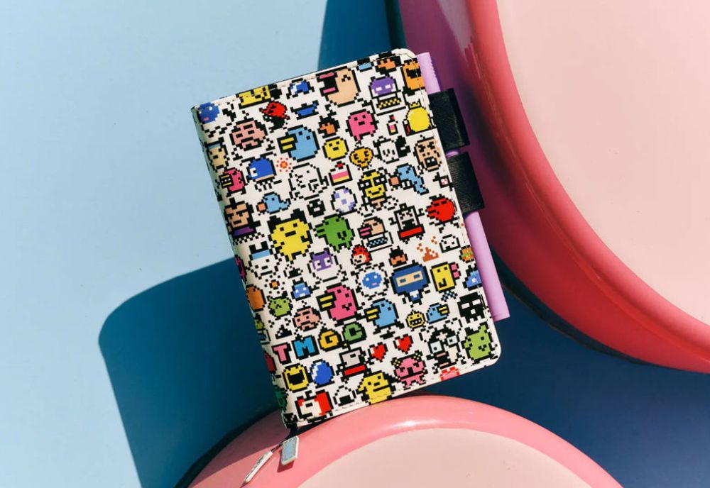 a hobonichi planner with a tamagochi cover