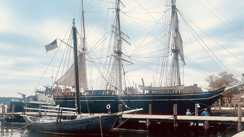 The Charles W Morgan at the Mystic Seaport Museum, a 19th century wooden whaling ship with tall masts and sails