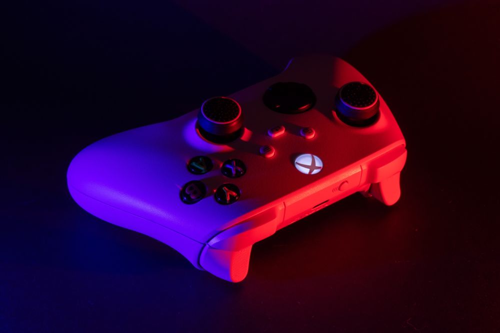 an xbox controller bathed in ominous lighting (credit: Skrypnykov Dmytro / Shutterstock)