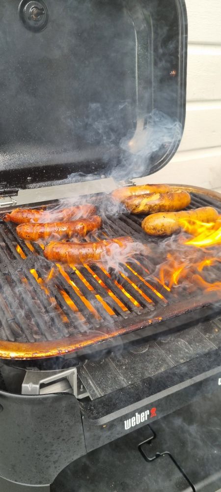 High emissions food (meat sausages) on a low emissions cooker