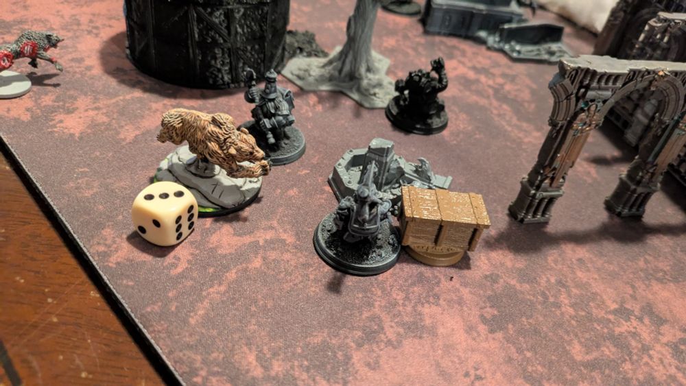 A bear attacks two dwarven thugs