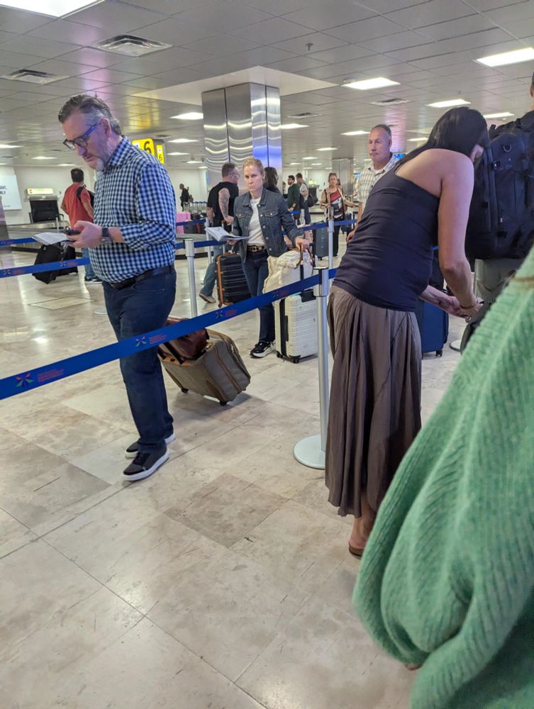 Ted Cruz in an airport staring at his phone, probably tweeting something at AOC in his smarmy way, maybe watching cuckold porn. His wife behind him in line, looking miserable as hell, knowing at some point in the near future she'll have to see him naked again, a thought that causes sharp pains in her back and headaches to sweep through her like cascading waves. 