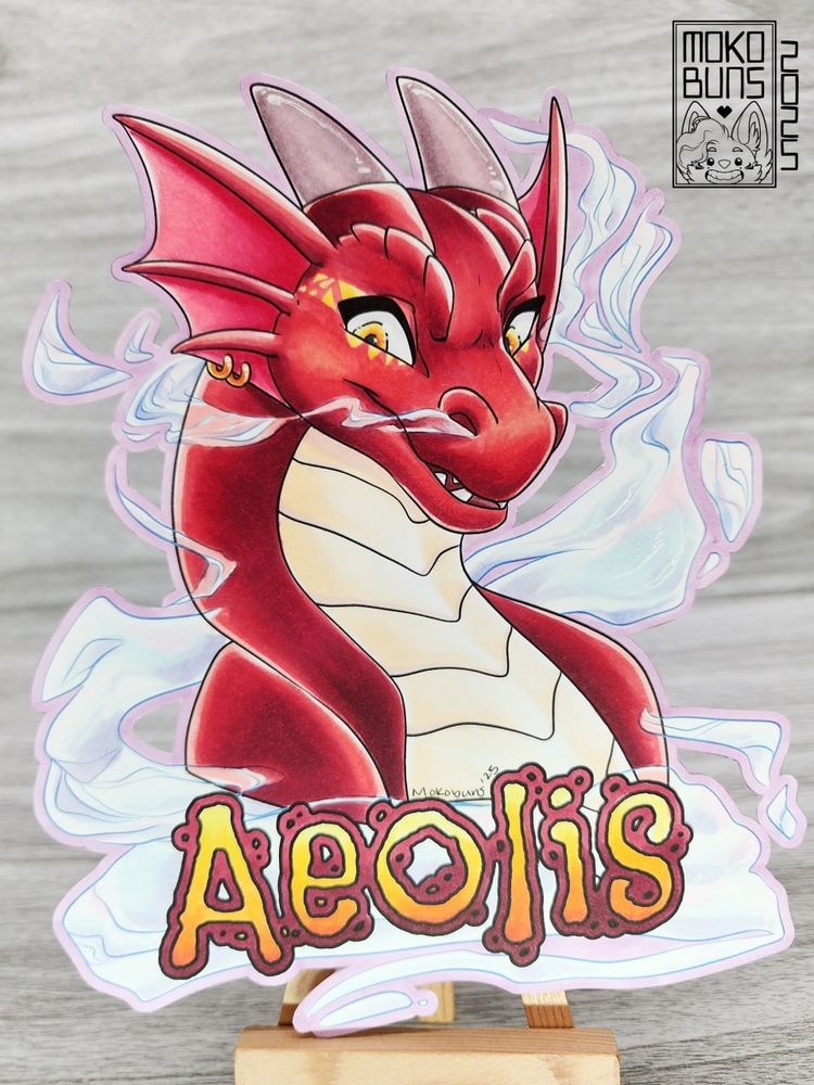 Picture of a badge of my kobold character, Aeolis, breathing smoke.