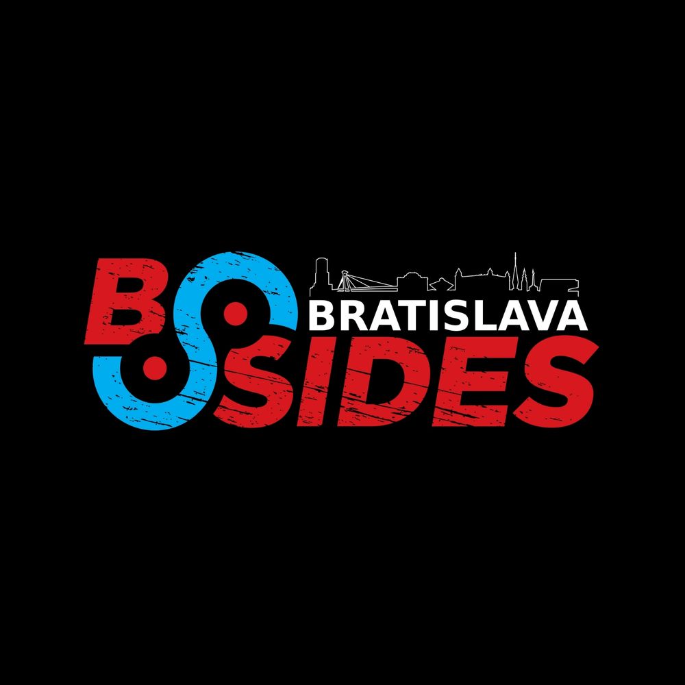 BSides Bratislava logo. Word BSides in red color, the cassete symbol in blue also indicating river Danube. On top of the standard BSides logo is an outline of Bratislava landmarks such as Bridge of the Slovak National Uprising, upside down pyramid of Slovak Radio or Bratislava castle. Underneath is the word Bratislava in white color.