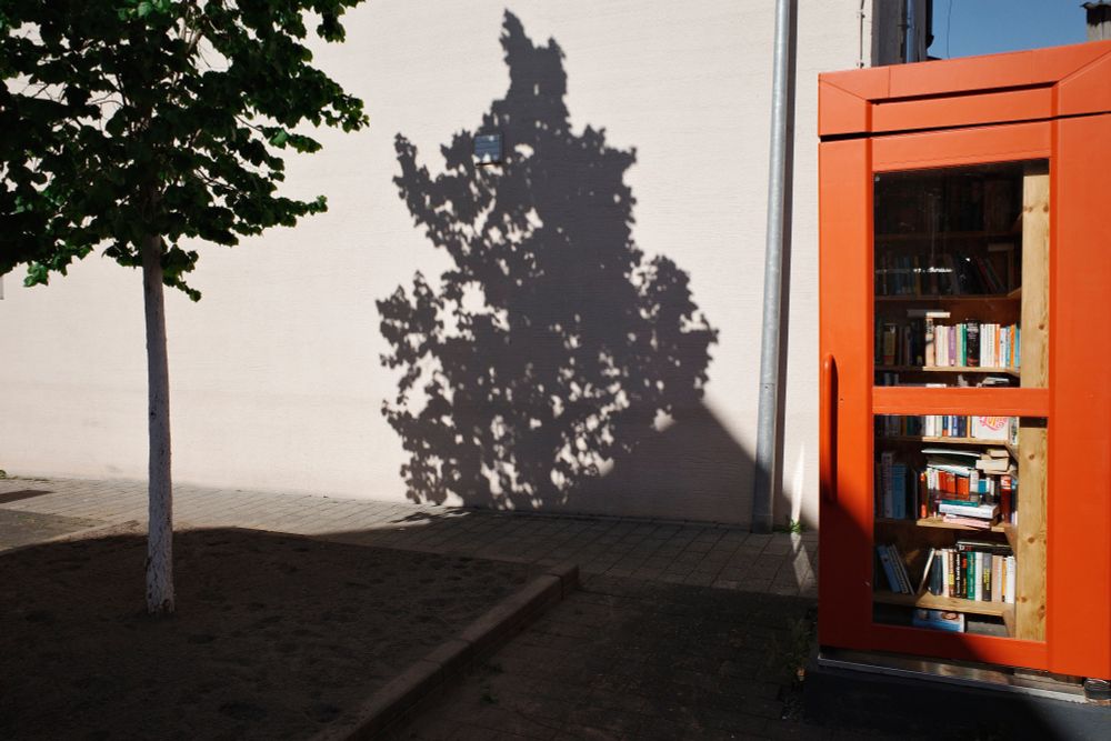 old telephone cell that is now a book giveaway